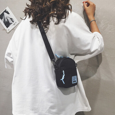 

Korea chic soft sister girl mini bag female 2019 new solid color wild nylon shoulder bag Messenger bag