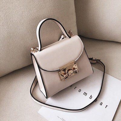 

Qiao Bani 2019 new South Korea ins fashion solid color simple lock flip cover bag shoulder shoulder diagonal female bag