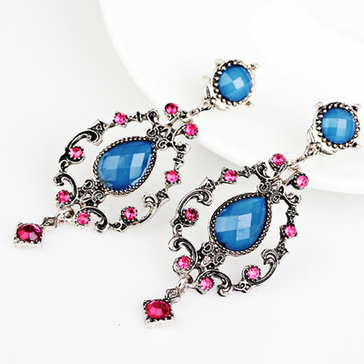

Europe Women Fashion Reiki Chakra Retro Wind Hollow Geometric Water Drops Earrings Bohemian Water Droplets Elegant Earrings