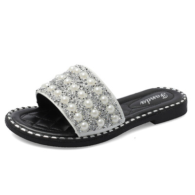 

Slippers women summer fashion sandals to wear 2019 new word drag Joker flat rhinestones Korean version of beach shoes