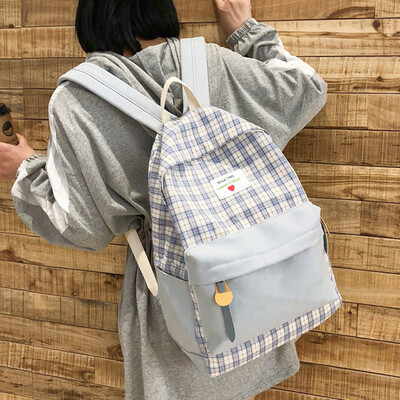 

Ins schoolbag female Korean version of high school students campus simple Mori ancient feeling light girl plaid double shoulder ba