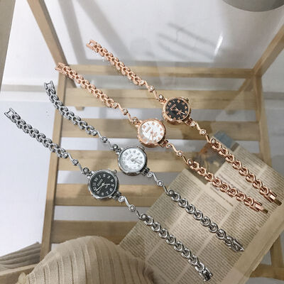 

Ins pink cherry blossom girl heart chain watch female students Korean version of simple retro small dial bracelet