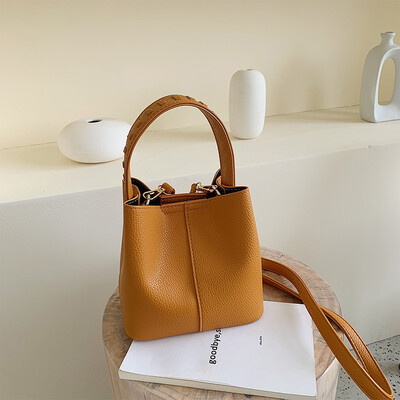 

Ins Early Autumn Retro Bag Fashion Simple Handheld Womens Bag New 2019 Litchi Bucket Messenger Bag