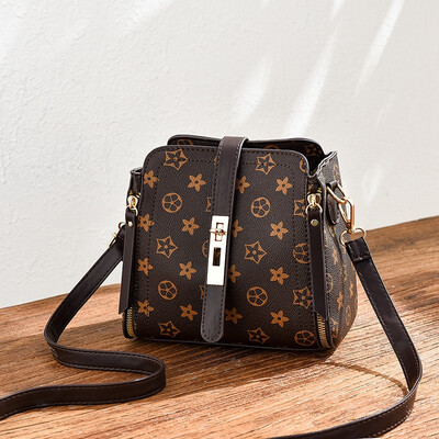 

Summer ladies go on the fashion trend with simple bucket bag on one shoulder in summer