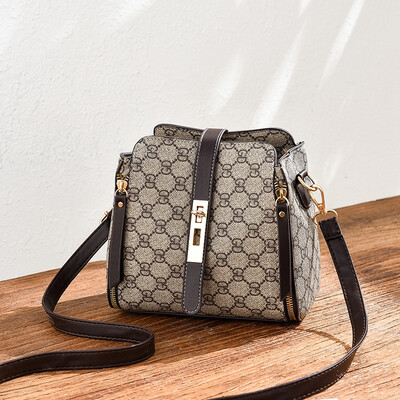 

Summer ladies go on the fashion trend with simple bucket bag on one shoulder in summer