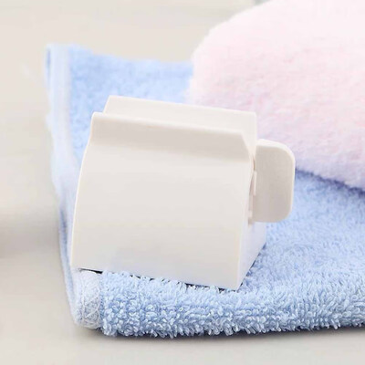 

Clip-on Tooth Paste Squeezer Manual Toothpaste Facial Cleanser Dispenser Useful