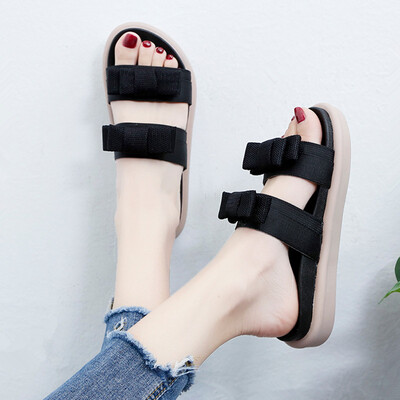 

In summer the Korean version of Joker color matching bow thick bottom slippers womens fashion wear muffin bottom word slippers