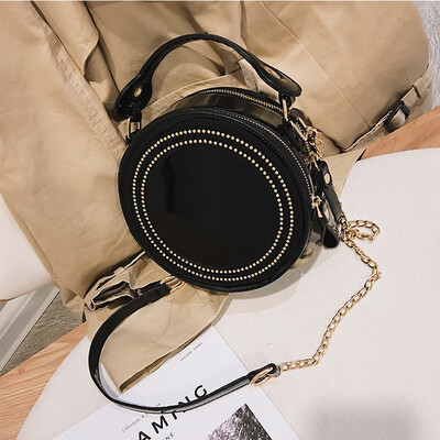 

Ins super fire bag female 2019 new portable fashion rivet casual wild chain shoulder slung small round bag