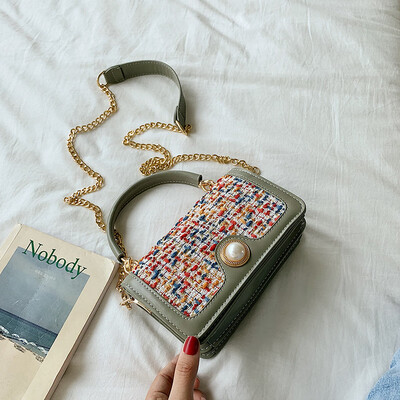 

Qiao Bani 2019 new South Korea Dongdaemun ins fashion contrast color flip bag hand strap shoulder diagonal tide handbag