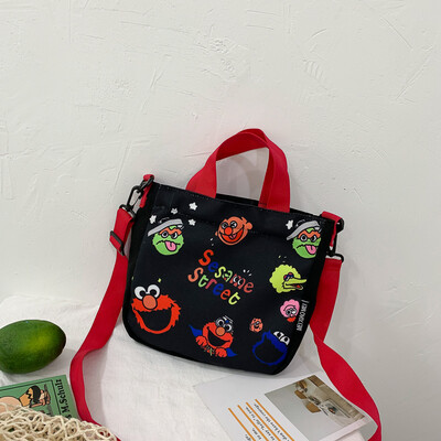 

Cute cartoon wild shoulder messenger bag female 2019 new casual fashion ugly cute Sesame Street portable canvas bag