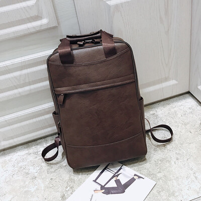 

European&American double - shoulder pack male large - capacity rain - proof pu - leather backpack personality fashion college