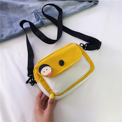 

2019 new cartoon cute canvas bag female fashion temperament contrast color Messenger bag chic casual wild shoulder bag