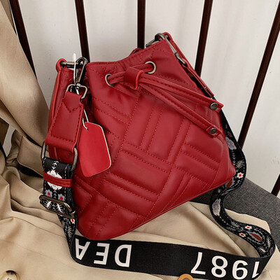 

In the fall of 2019 the new lady slanted wide shoulder belt rhomboid belt bucket bag fashion one shoulder bag one shoulder b