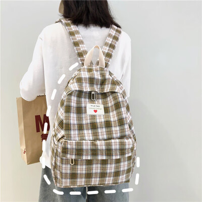 

Schoolbag female ins wind Korean college students backpack high school sen department ancient sense sen department grid Joker back