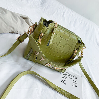 

Bag female new Korean version of the tide fashion stone pattern bucket bag portable Messenger fashion wide shoulder shou
