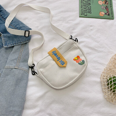 

Small bag canvas bag womens shoulder Messenger bag college students color Joker Korean version of the ancient feeling girl ins Se