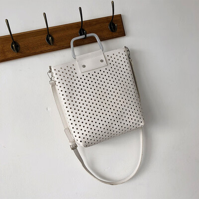 

Summer new hollow large-capacity bag female 2019 new wave wild single shoulder slung fashion portable tote bag