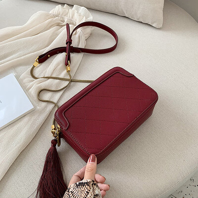 

Qiao Bani 2019 new Korean version of the fashion Dongdaemun snake double pull pillow bag trend single shoulder diagonal handbag
