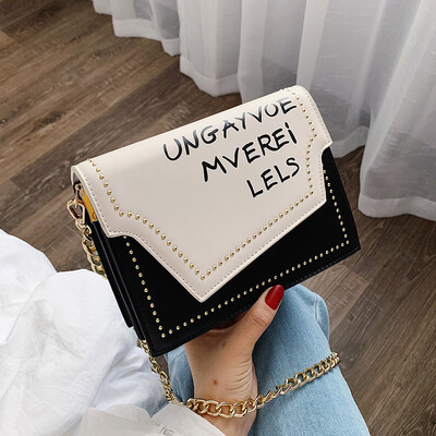 

Qiao Bani 2019 new Korea Dongdaemun fashion rivet flip bag shoulder diagonal tide handbag