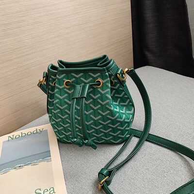 

Qiao Bani 2019 new Korean chic fashion dog teeth bucket bag collision color single shoulder diagonal trend handbags