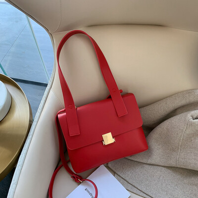 

Retro large-capacity bag female new Korean fashion briefcase wide shoulder strap shoulder slung big bag