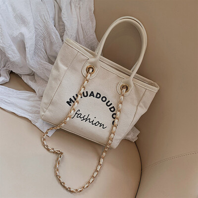 

Qiao Bani 2019 new European&American style fashion simple canvas chain bag hand strap shoulder tide female bag a generation
