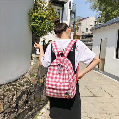 

Girl plaid schoolbag female Korean version of high school students campus small fresh backpack double shoulder bag girl