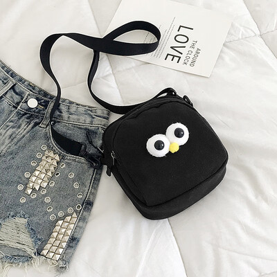 

2019 new cute big eyes canvas bag casual cartoon girl shoulder bag fashion simple wild Messenger bag