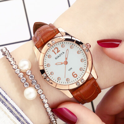 

Watch female Korean version of simple fashion waterproof high school student belt luminous rhinestone cute fashion watch quartz wa