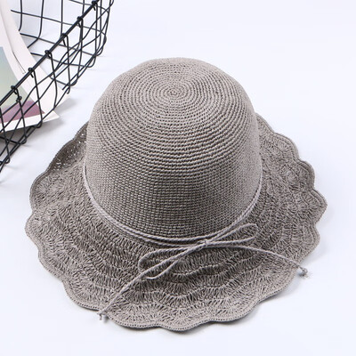 

New ladies outdoor outing bow sun hat vacation hollow sun hat hundred set summer straw hat wholesale
