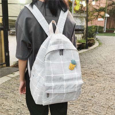 

Ins schoolbag female Korean version of high school students backpack ancient feeling girl 100 campus plaid double shoulder bag