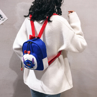 

Backpack female 2019 new fashion cartoon canvas mini backpack tide Korean version of the wild Harajuku student bag