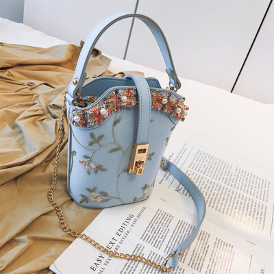 

New small bag female 2019 new wave Korean version of the wild shoulder slung fashion gas chain lace bucket bag