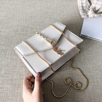 

Qiao Bani 2019 new South Korea Dongdaemun fashion simple solid color chain small square bag shoulder diagonal female bag