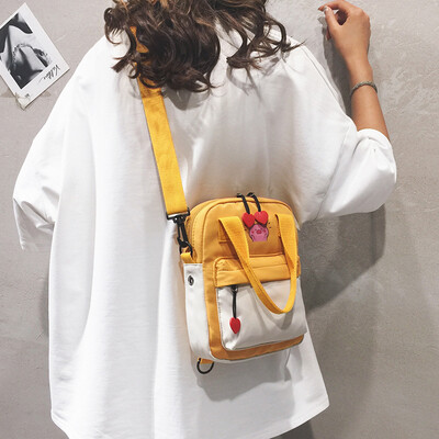 

Small fresh Harajuku student small bag female 2019 fashion wild wide shoulder strap shoulder Messenger bag portable canvas bag
