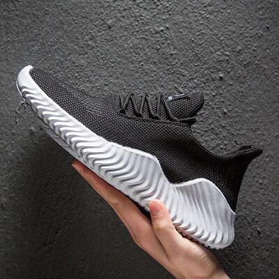 

Cross-border large size mens shoes 2019 summer new Korean version of breathable flying woven shoes mens wild student running shoes