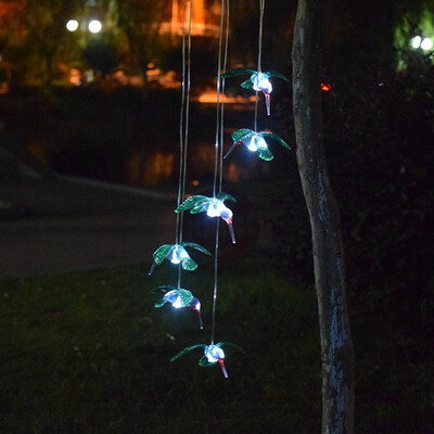 

Cross-border dedicated solar wind chime lights wind turn lights hummingbird solar gift lights color LED garden hanging lights