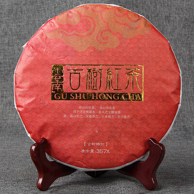

Chinese Ancient trees black tea leaves old tea sunburn 357g tea cake F220