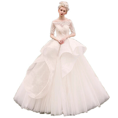 

Illusion Tiered Wave Backless Lace Half Sleeves Ball Gown Wedding