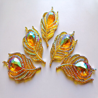

20pcs new fashion style sew on rhinestones flatback leaf feather shape 2550mm Golden handsewing gem stones crystal
