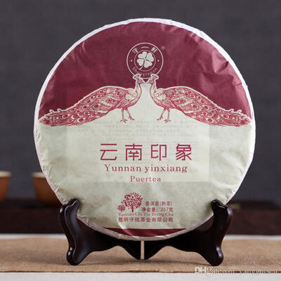 

Wholesale Puer tea ripe tea Menghai seven sub-cake early spring puer tea Yunnan impression factory direct