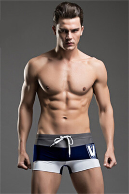 

2018 new swimwear low waist stitching fashion V section tide swimwear mens flat corner swimming trunks