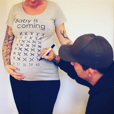 

Maternity clothes baby is coming T-shirt for pregnant woman