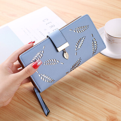 

The New Korean Version Of Womens Purse Long Style With A Hollowed-out Leaves Zipper Clasp Purse Card Bag