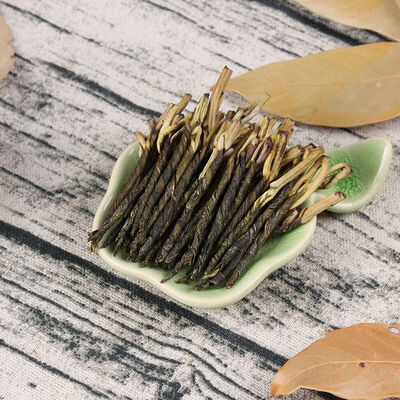 

Handmade Wild Ancient Tree High Mountain Ku Ding Cha Bitter Taste Herbal Tea
