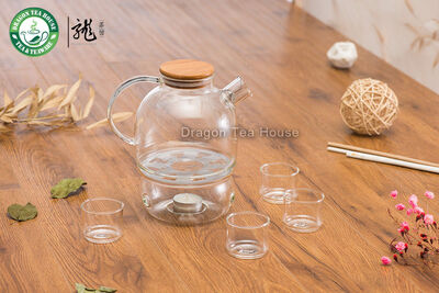 

Lead-free Borosilicate Clear Glass Tea Set 970ml Teapot with Warmer Four Teacups