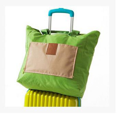 

Korea portable travel bag folding folding hit color travel bag bag wearable baggage bag