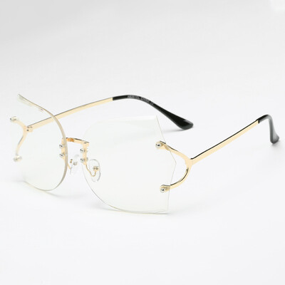 

2017 fashion new trend glasses rimless cut edge lady sunglasses polarized mirror mirror ocean film irregular glasses
