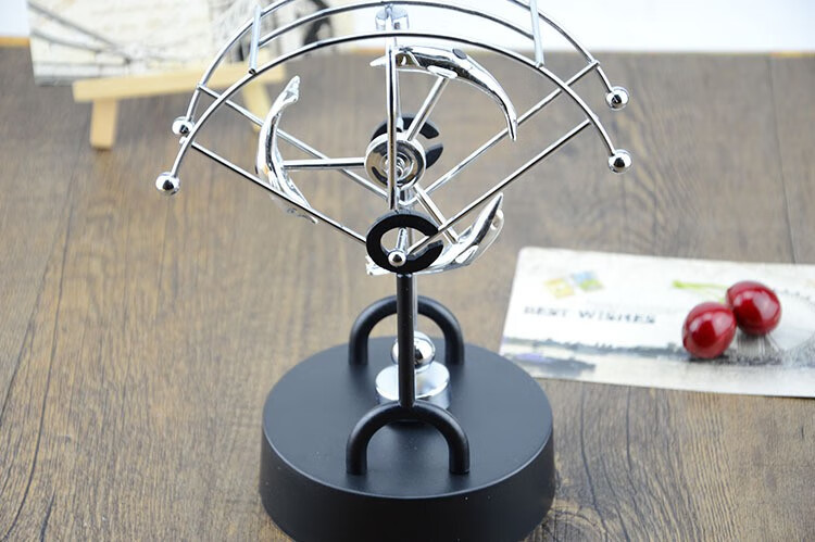 永动摆件金属永动仪牛顿摆创意海豚旋转电磁摇摆器办公室装饰摆件生日