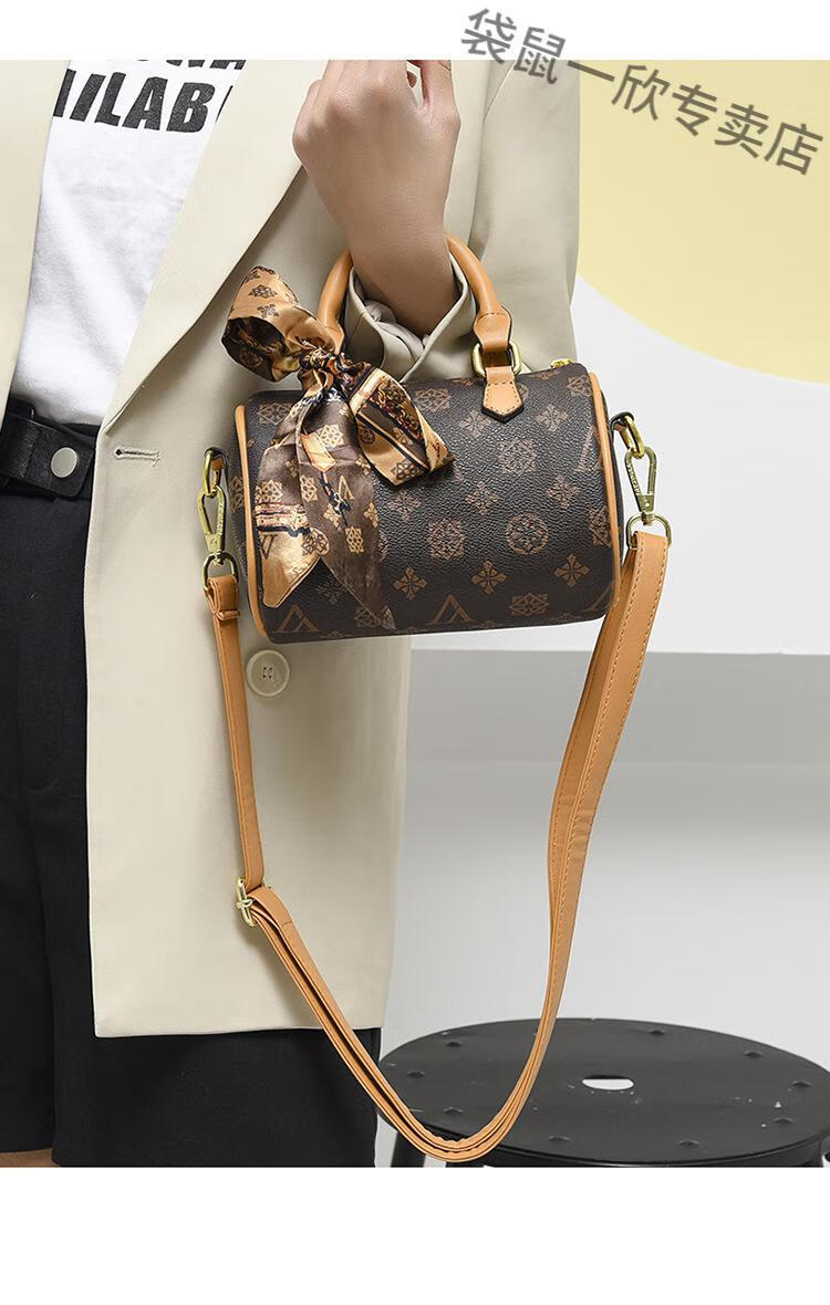 袋鼠轻奢品牌官方旗舰唯唯袋鼠包包女包2022新款时尚经典手提圆筒包